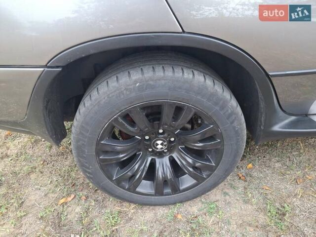 Серый БМВ Х5, объемом двигателя 3 л и пробегом 330 тыс. км за 11400 $, фото 14 на Automoto.ua