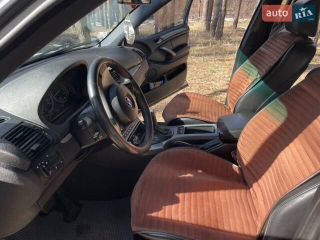 Серый БМВ Х5, объемом двигателя 3 л и пробегом 375 тыс. км за 10500 $, фото 7 на Automoto.ua