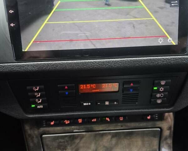 Серый БМВ Х5, объемом двигателя 4.4 л и пробегом 301 тыс. км за 9500 $, фото 28 на Automoto.ua