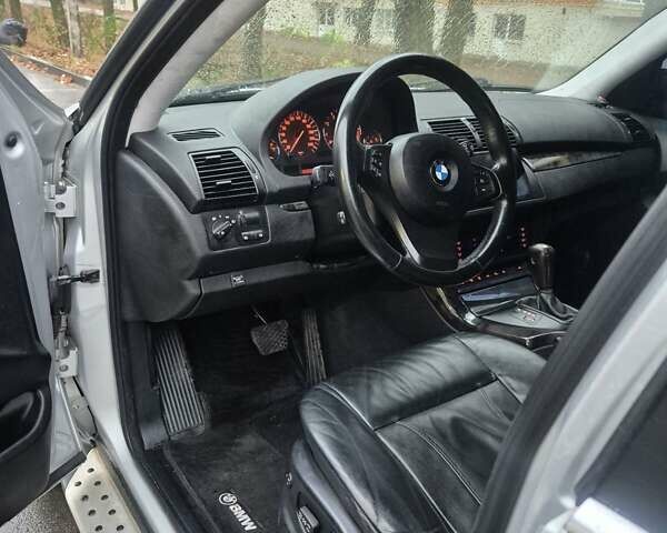 Серый БМВ Х5, объемом двигателя 4.4 л и пробегом 301 тыс. км за 9500 $, фото 26 на Automoto.ua