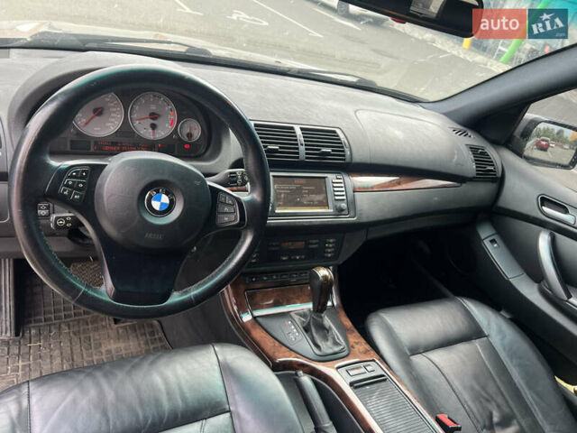 Серый БМВ Х5, объемом двигателя 4.8 л и пробегом 143 тыс. км за 18000 $, фото 13 на Automoto.ua