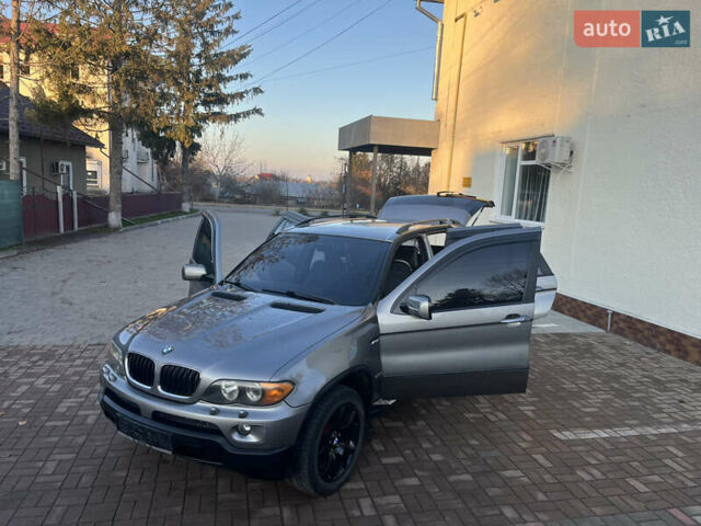 Сірий БМВ Х5, об'ємом двигуна 3 л та пробігом 293 тис. км за 11099 $, фото 21 на Automoto.ua