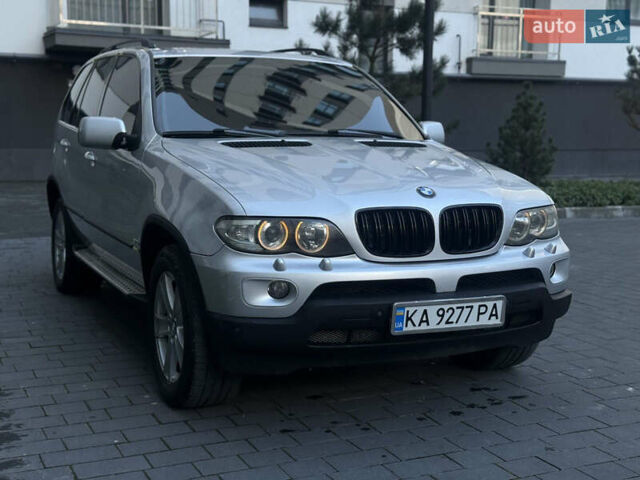 Серый БМВ Х5, объемом двигателя 3 л и пробегом 370 тыс. км за 10000 $, фото 3 на Automoto.ua