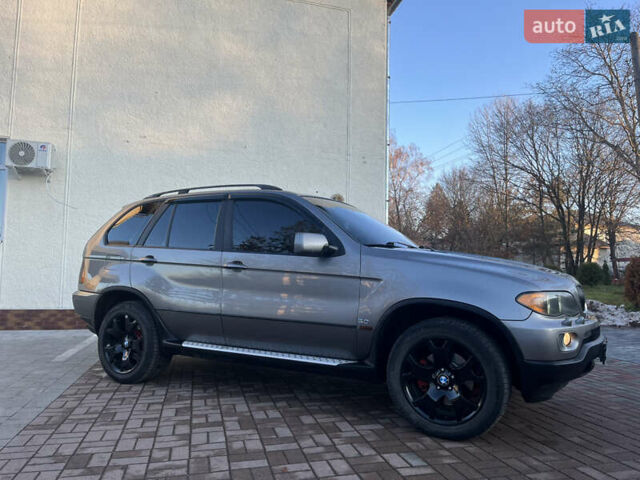 Сірий БМВ Х5, об'ємом двигуна 3 л та пробігом 293 тис. км за 11099 $, фото 2 на Automoto.ua