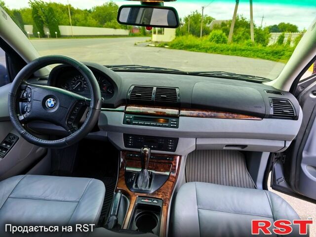 Серый БМВ Х5, объемом двигателя 3 л и пробегом 294 тыс. км за 8450 $, фото 6 на Automoto.ua