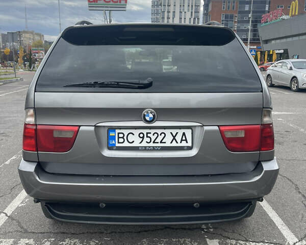 Серый БМВ Х5, объемом двигателя 3 л и пробегом 443 тыс. км за 11200 $, фото 4 на Automoto.ua