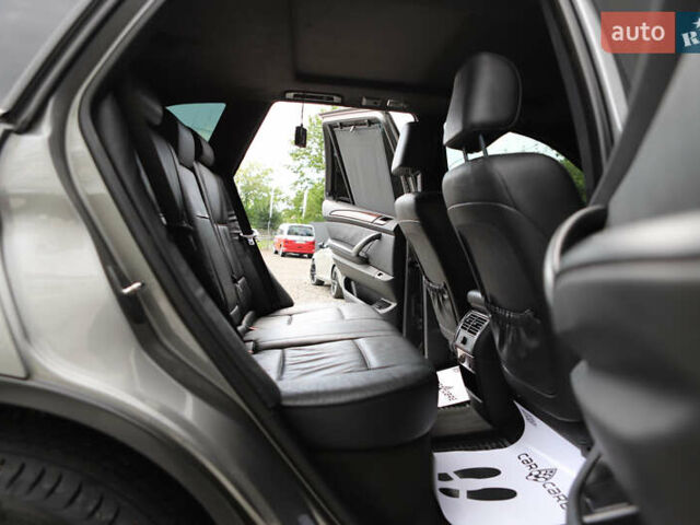 Серый БМВ Х5, объемом двигателя 3 л и пробегом 290 тыс. км за 16500 $, фото 61 на Automoto.ua