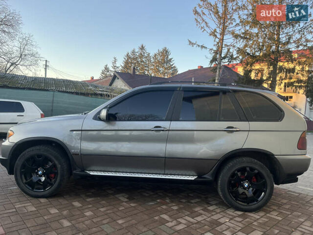 Сірий БМВ Х5, об'ємом двигуна 3 л та пробігом 293 тис. км за 11099 $, фото 17 на Automoto.ua