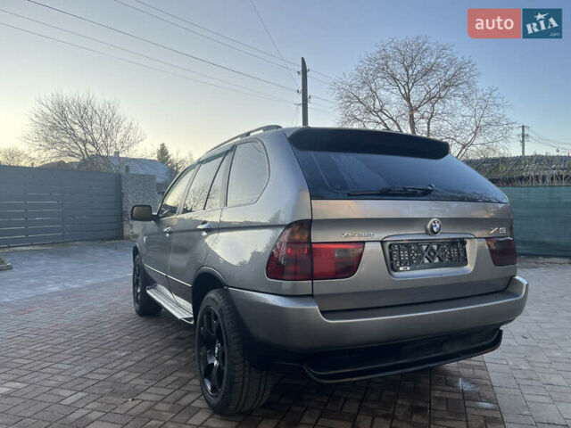 Сірий БМВ Х5, об'ємом двигуна 3 л та пробігом 293 тис. км за 11099 $, фото 4 на Automoto.ua