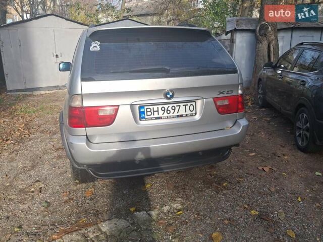 Серый БМВ Х5, объемом двигателя 3 л и пробегом 252 тыс. км за 12800 $, фото 1 на Automoto.ua