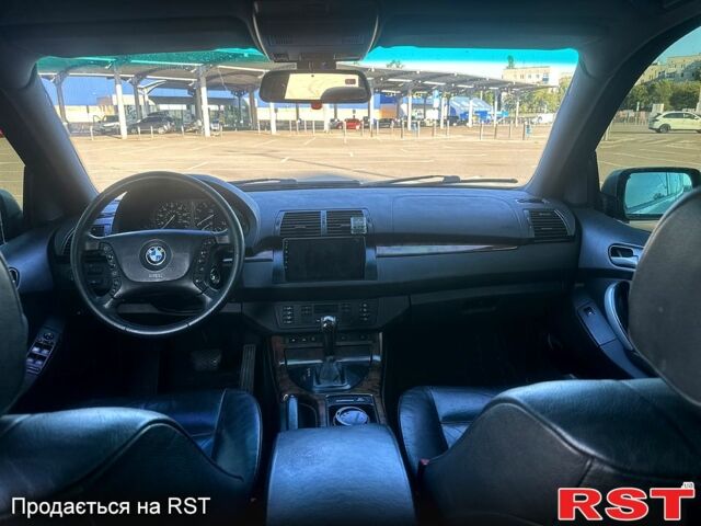 Серый БМВ Х5, объемом двигателя 3 л и пробегом 300 тыс. км за 8999 $, фото 2 на Automoto.ua