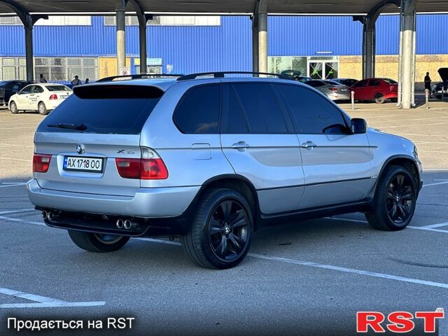 Серый БМВ Х5, объемом двигателя 3 л и пробегом 300 тыс. км за 8999 $, фото 1 на Automoto.ua