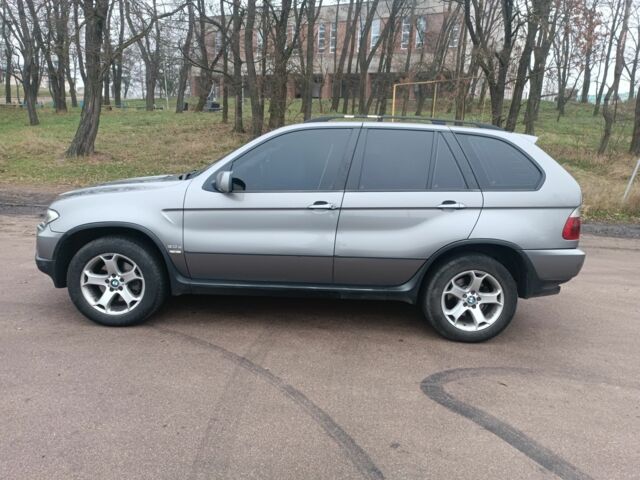 Серый БМВ Х5, объемом двигателя 3 л и пробегом 445 тыс. км за 11000 $, фото 6 на Automoto.ua