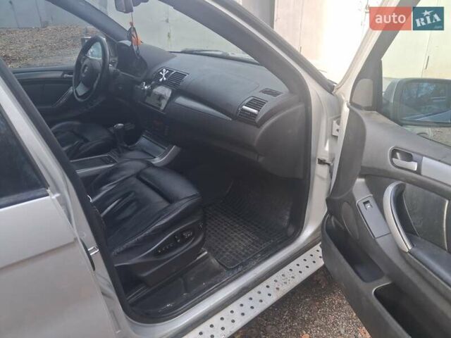Серый БМВ Х5, объемом двигателя 3 л и пробегом 252 тыс. км за 12800 $, фото 4 на Automoto.ua