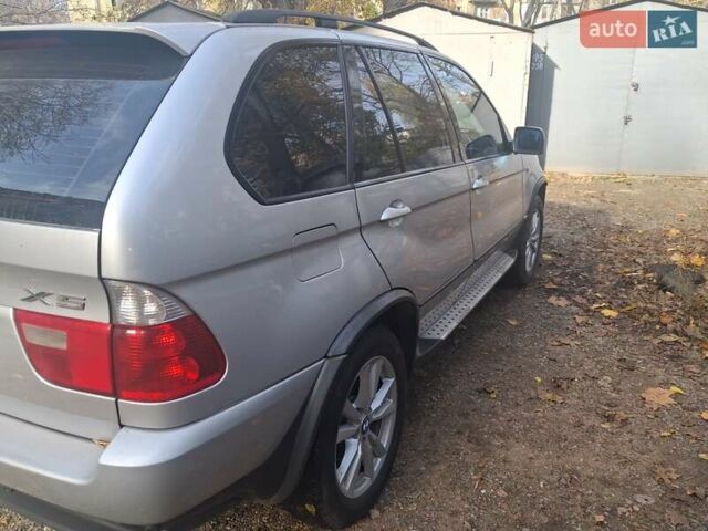 Серый БМВ Х5, объемом двигателя 3 л и пробегом 252 тыс. км за 12800 $, фото 2 на Automoto.ua