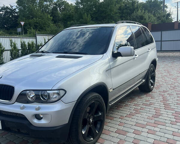 Серый БМВ Х5, объемом двигателя 3 л и пробегом 390 тыс. км за 10900 $, фото 1 на Automoto.ua