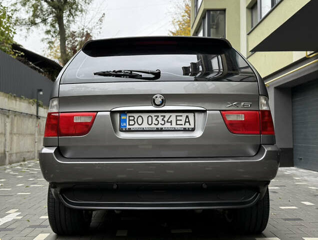 Серый БМВ Х5, объемом двигателя 3 л и пробегом 355 тыс. км за 11999 $, фото 4 на Automoto.ua