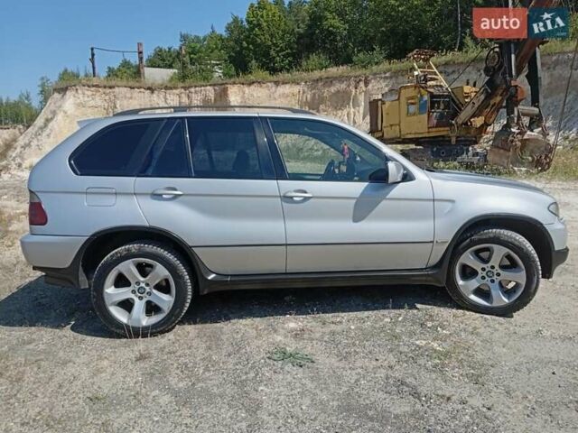 Серый БМВ Х5, объемом двигателя 3 л и пробегом 312 тыс. км за 10200 $, фото 1 на Automoto.ua
