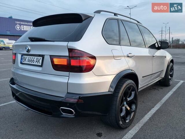 Серый БМВ Х5, объемом двигателя 3 л и пробегом 290 тыс. км за 19999 $, фото 9 на Automoto.ua