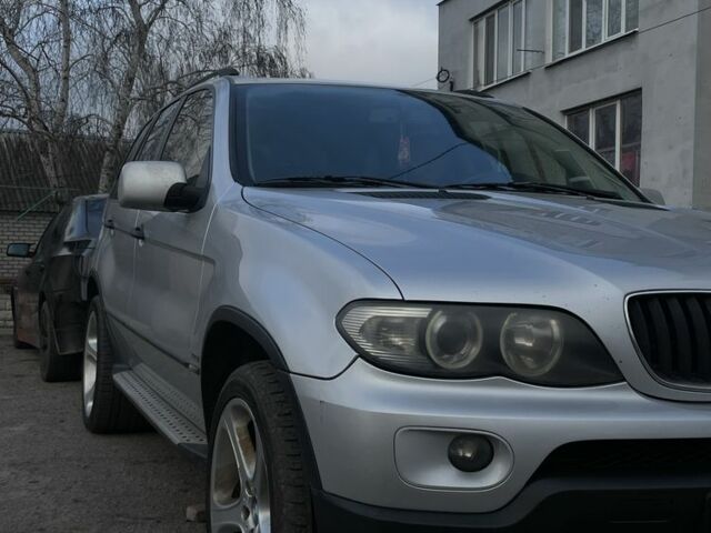 Сірий БМВ Х5, об'ємом двигуна 3 л та пробігом 318 тис. км за 8000 $, фото 3 на Automoto.ua
