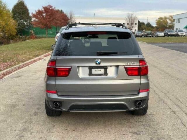 Серый БМВ Х5, объемом двигателя 3 л и пробегом 134 тыс. км за 8700 $, фото 5 на Automoto.ua