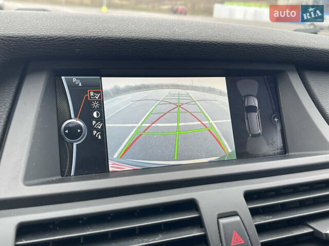 Серый БМВ Х5, объемом двигателя 3 л и пробегом 328 тыс. км за 16950 $, фото 30 на Automoto.ua