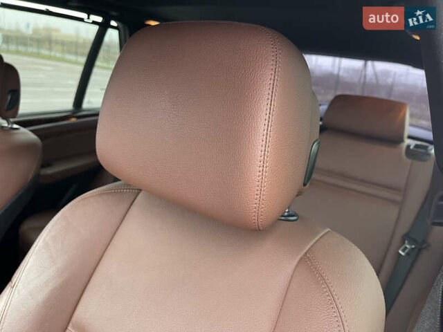 Серый БМВ Х5, объемом двигателя 3 л и пробегом 328 тыс. км за 16950 $, фото 23 на Automoto.ua