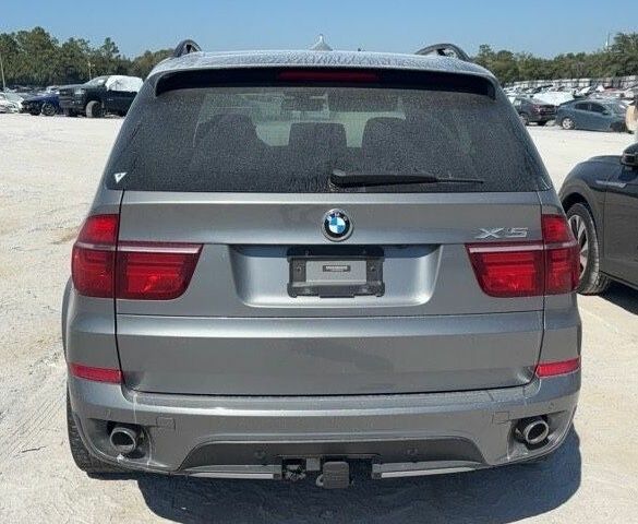 Серый БМВ Х5, объемом двигателя 3 л и пробегом 192 тыс. км за 10000 $, фото 6 на Automoto.ua