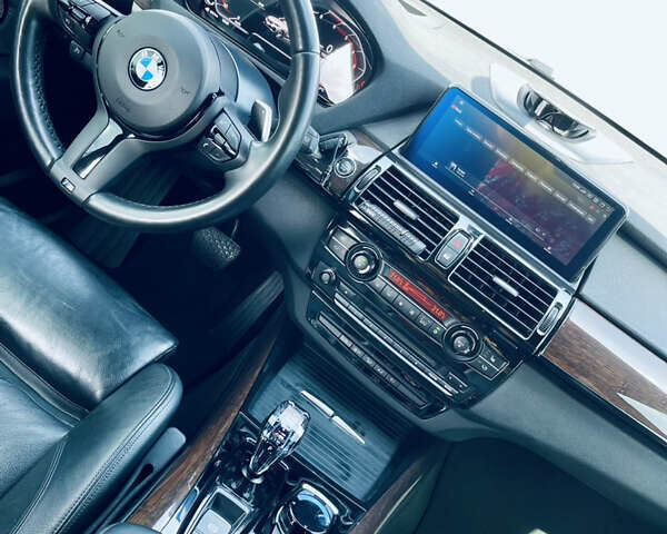 Сірий БМВ Х5, об'ємом двигуна 2.99 л та пробігом 170 тис. км за 26000 $, фото 4 на Automoto.ua