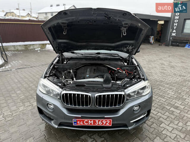 Серый БМВ Х5, объемом двигателя 3 л и пробегом 230 тыс. км за 14900 $, фото 39 на Automoto.ua