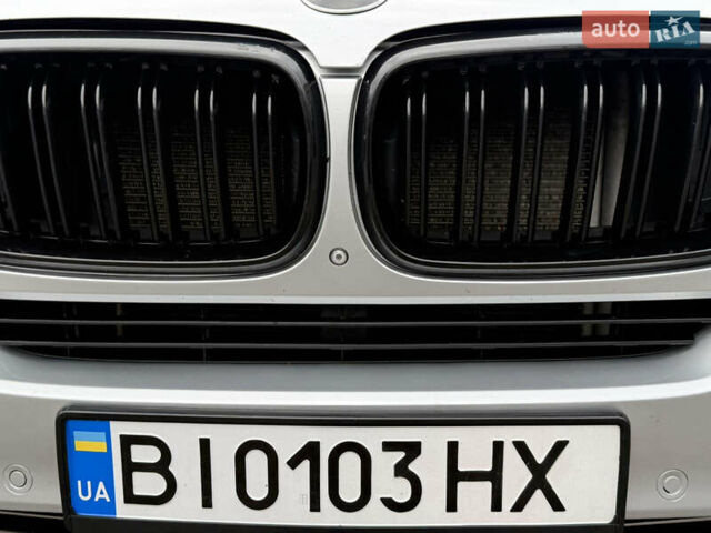 Серый БМВ Х5, объемом двигателя 3 л и пробегом 294 тыс. км за 22100 $, фото 13 на Automoto.ua