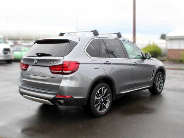 Серый БМВ Х5, объемом двигателя 3 л и пробегом 82 тыс. км за 13800 $, фото 6 на Automoto.ua