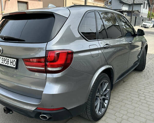 Серый БМВ Х5, объемом двигателя 2.99 л и пробегом 245 тыс. км за 24400 $, фото 4 на Automoto.ua