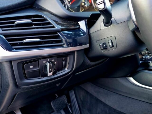 Серый БМВ Х5, объемом двигателя 3 л и пробегом 130 тыс. км за 36900 $, фото 7 на Automoto.ua