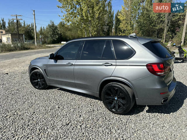 Серый БМВ Х5, объемом двигателя 3 л и пробегом 290 тыс. км за 29500 $, фото 6 на Automoto.ua