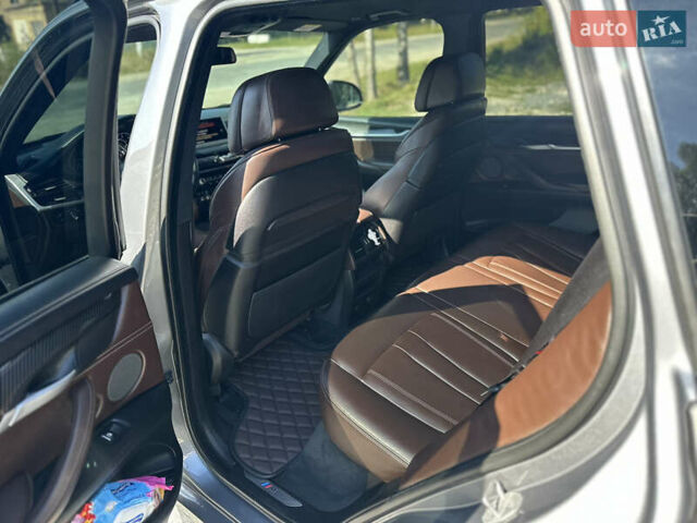 Серый БМВ Х5, объемом двигателя 3 л и пробегом 290 тыс. км за 29500 $, фото 16 на Automoto.ua