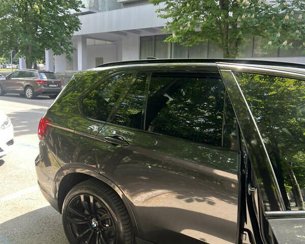 Серый БМВ Х5, объемом двигателя 3 л и пробегом 98 тыс. км за 27400 $, фото 2 на Automoto.ua