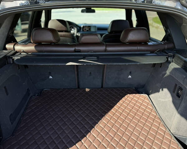 Серый БМВ Х5, объемом двигателя 3 л и пробегом 305 тыс. км за 28000 $, фото 12 на Automoto.ua