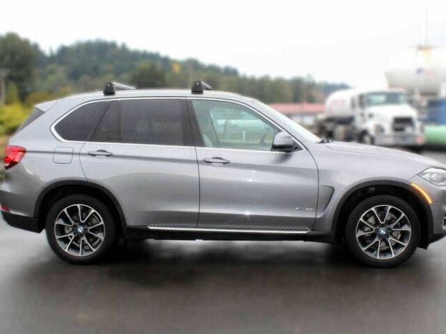 Серый БМВ Х5, объемом двигателя 3 л и пробегом 82 тыс. км за 13800 $, фото 7 на Automoto.ua