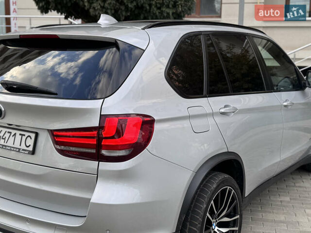 Серый БМВ Х5, объемом двигателя 3 л и пробегом 161 тыс. км за 21990 $, фото 47 на Automoto.ua