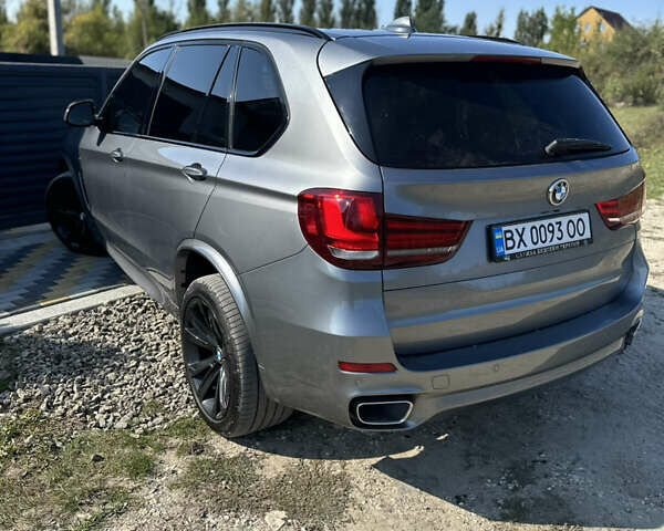 Серый БМВ Х5, объемом двигателя 3 л и пробегом 290 тыс. км за 29500 $, фото 11 на Automoto.ua