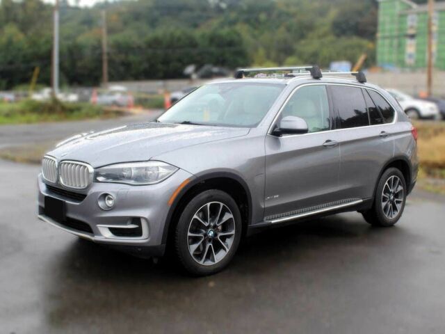 Серый БМВ Х5, объемом двигателя 3 л и пробегом 82 тыс. км за 13800 $, фото 2 на Automoto.ua