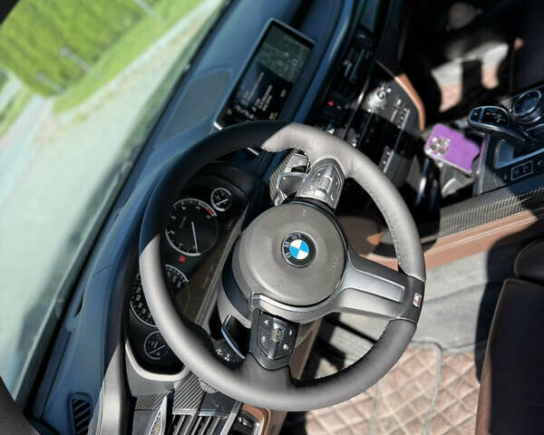 Серый БМВ Х5, объемом двигателя 3 л и пробегом 305 тыс. км за 28000 $, фото 9 на Automoto.ua