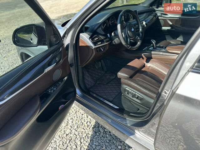 Серый БМВ Х5, объемом двигателя 3 л и пробегом 290 тыс. км за 29500 $, фото 14 на Automoto.ua