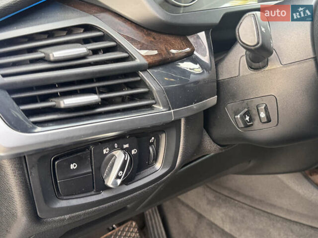 Серый БМВ Х5, объемом двигателя 3 л и пробегом 161 тыс. км за 21990 $, фото 57 на Automoto.ua