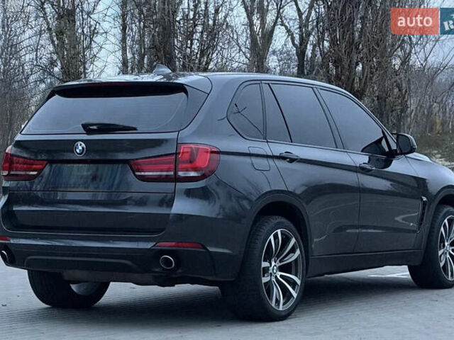 Серый БМВ Х5, объемом двигателя 2 л и пробегом 268 тыс. км за 21500 $, фото 4 на Automoto.ua