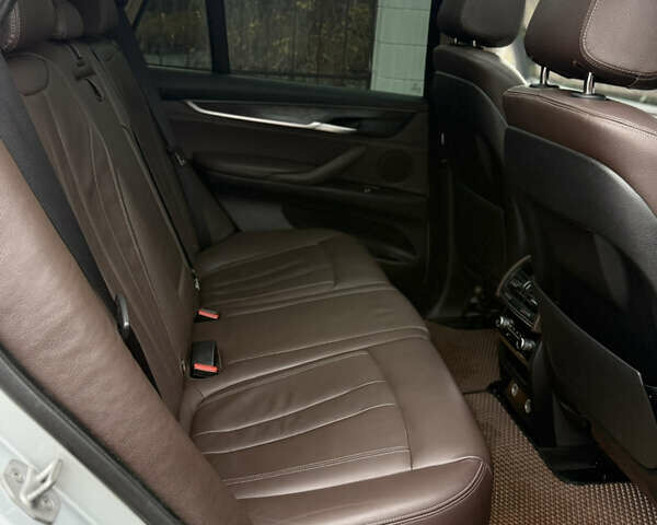 Серый БМВ Х5, объемом двигателя 3 л и пробегом 294 тыс. км за 22100 $, фото 24 на Automoto.ua