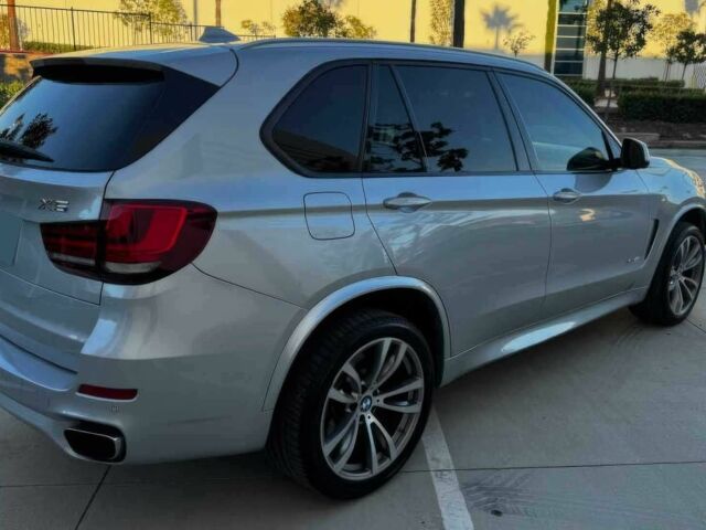 Серый БМВ Х5, объемом двигателя 4.4 л и пробегом 79 тыс. км за 9800 $, фото 4 на Automoto.ua