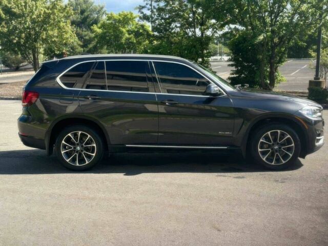 Серый БМВ Х5, объемом двигателя 3 л и пробегом 78 тыс. км за 14600 $, фото 2 на Automoto.ua