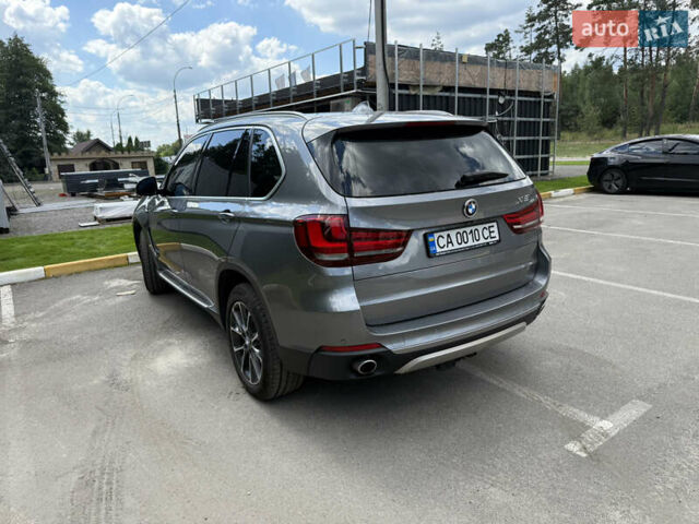 Сірий БМВ Х5, об'ємом двигуна 2.99 л та пробігом 145 тис. км за 32500 $, фото 4 на Automoto.ua